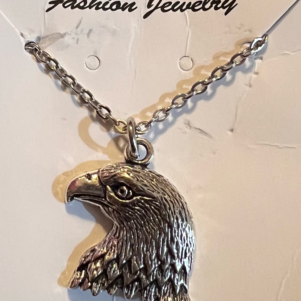 Alloy Eagle head necklace. 18" chain with a lobster claw hook. New never warn.